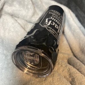 Black flame candle with wax drips, epoxy coating.